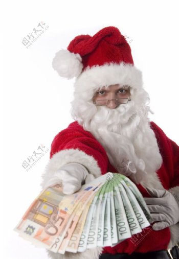 拿着钱的圣诞老人图片