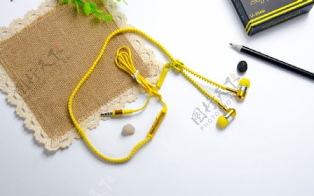 拉链耳机耳机黄色摄影J图片