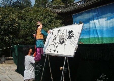 扬州瘦西湖木偶作画图片