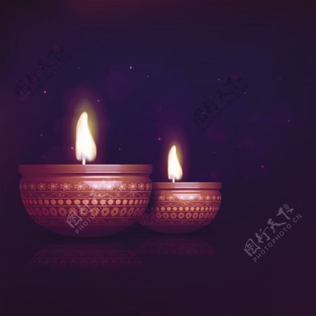 两个燃烧的蜡烛暗排灯节的背景