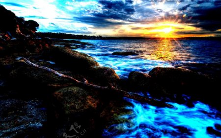 日出东海大海海浪石头夕阳太阳日出东方图片