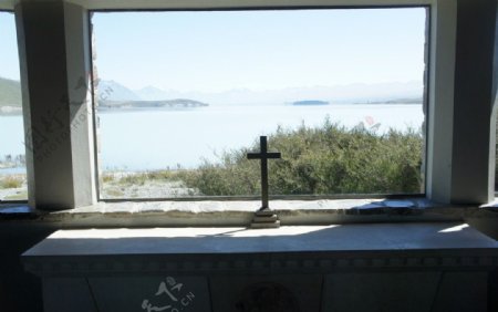 新西兰之蒂卡波湖和湖边教堂的十字架图片
