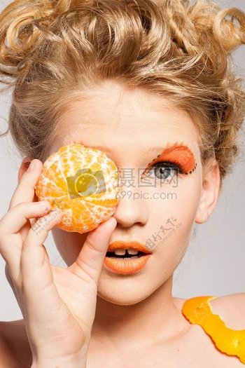 时尚女人模型橙色肖像化妆水果美容橘子