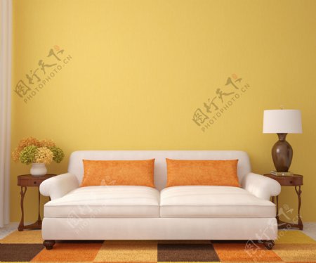 黄色墙壁前的沙发图片