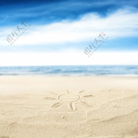 沙子上的太阳图片